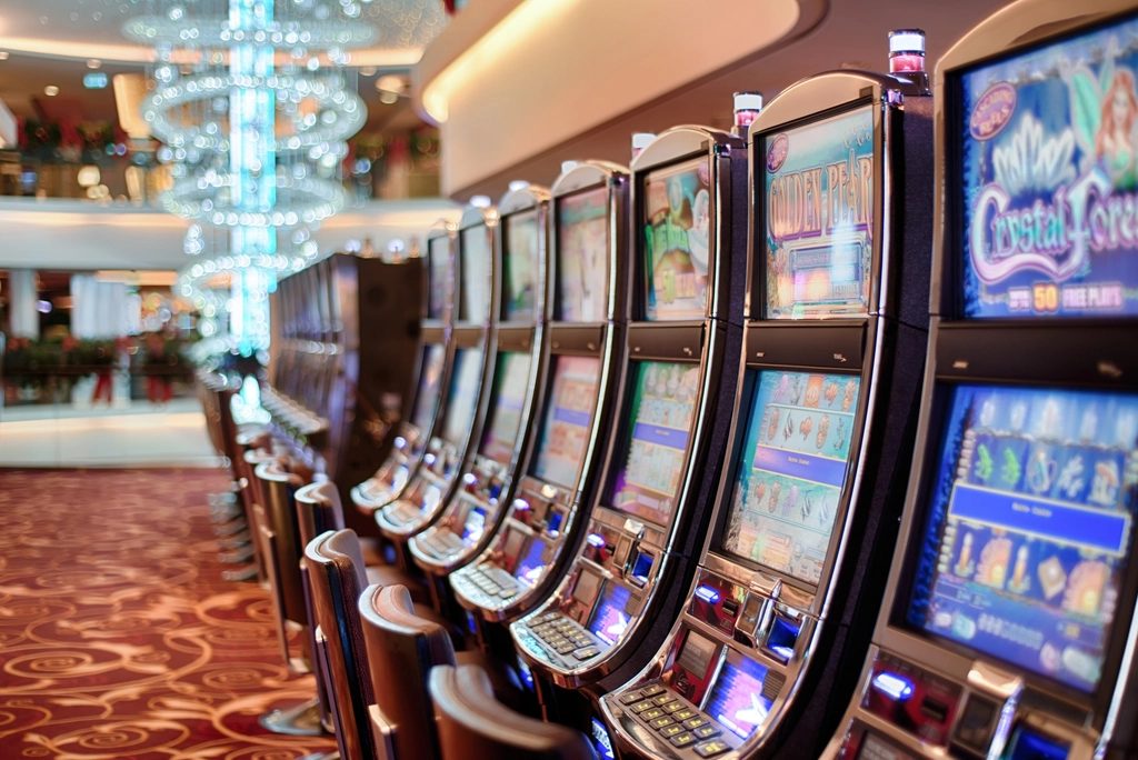 Casino floor with rows of slot machines