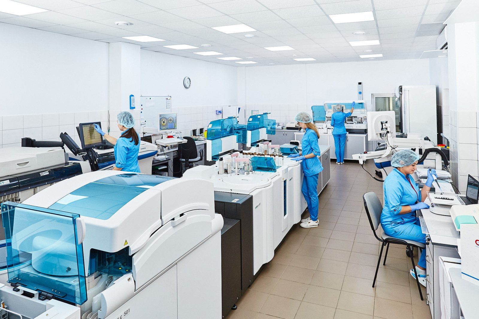 Scientists working at a laboratory bench